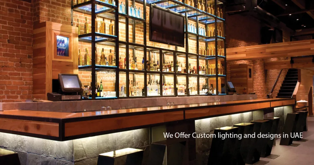 modern interior space featuring layered lighting including cove lights, pendant fixtures and accent lighting designed by homies interior fitouts & renovations uae.