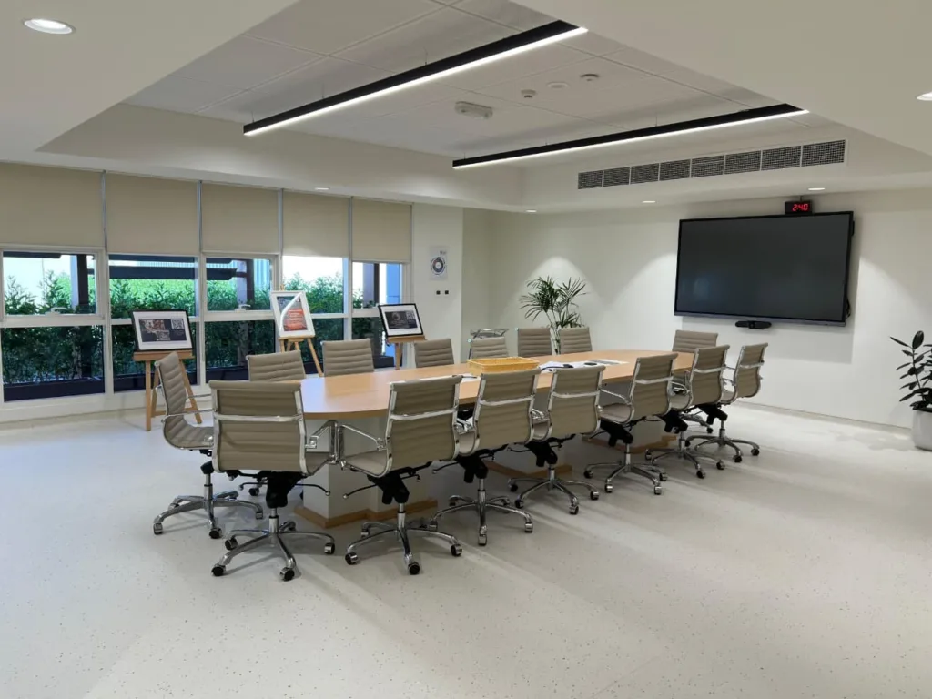 Modern Dwight school conference room with large table