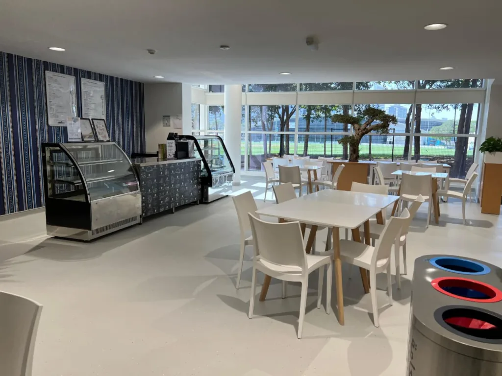 Modern Dwight school cafeteria with seating area