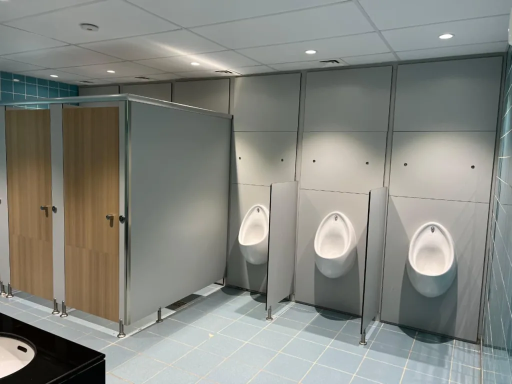 HPL cubicle installation in school washroom
